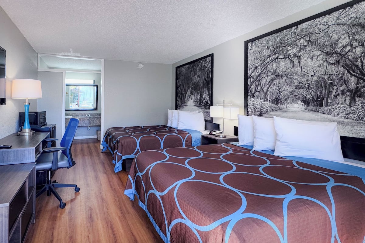 Pillow-top beds, desk, blackout curtains, iron/ironing board