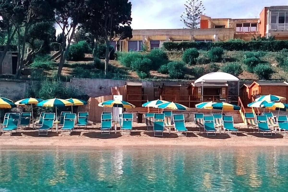 private beach nearby, black sand, beach shuttle, sun-loungers