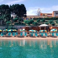 Playa privada en los alrededores, traslado desde/hacia la playa
