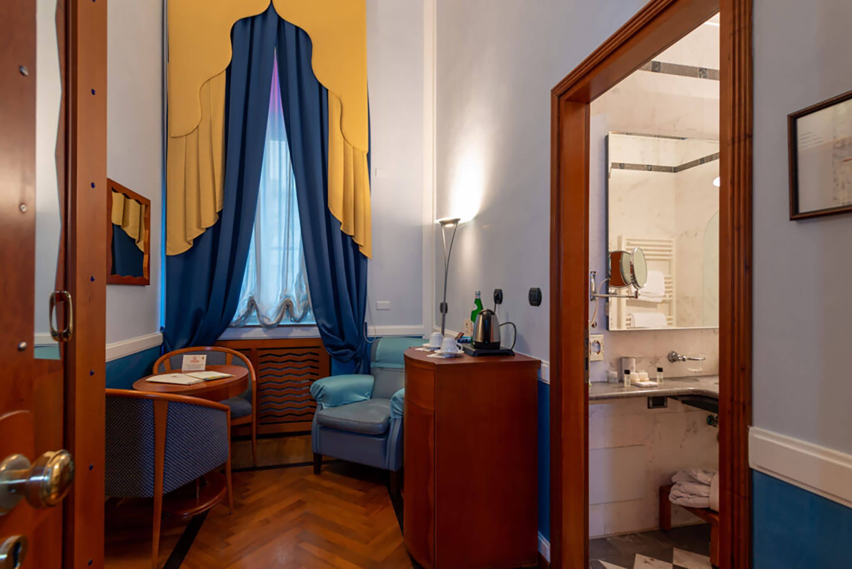 deluxe room | premium bedding, minibar, in-room safe, desk