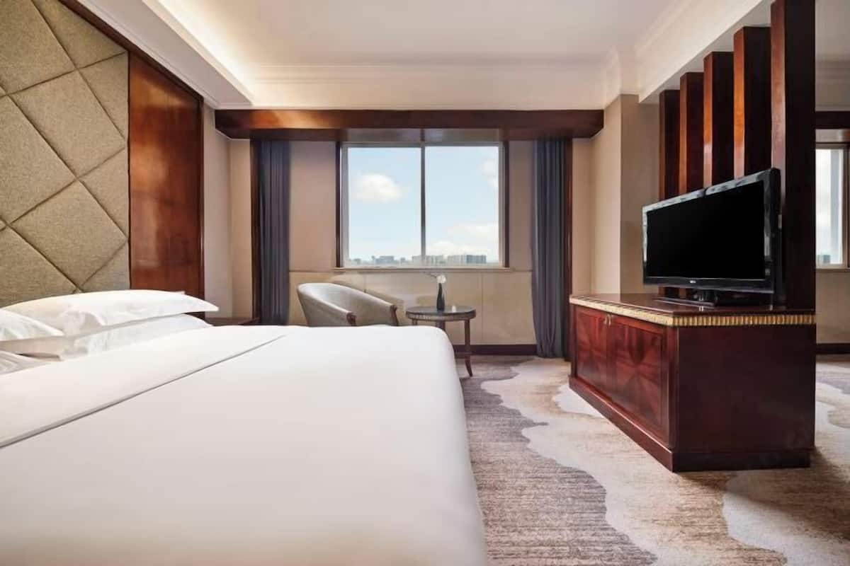 Luxe beddengoed, een minibar, een kluis op de kamer, een bureau