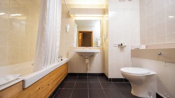 Separate tub and shower, hair dryer, towels