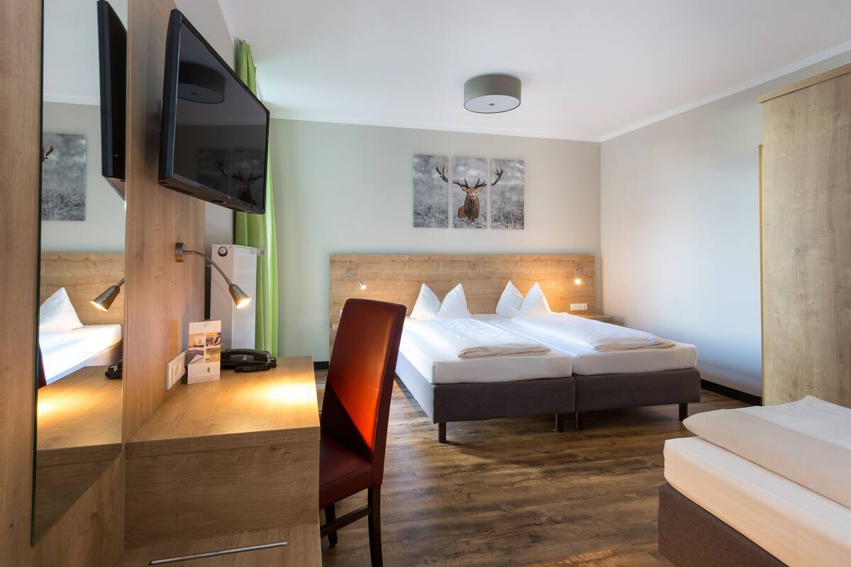 Comfort Triple Room | In-room safe, desk, soundproofing, cribs (surcharge)