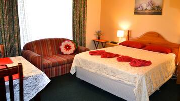 Select Comfort beds, desk, blackout curtains, iron/ironing board