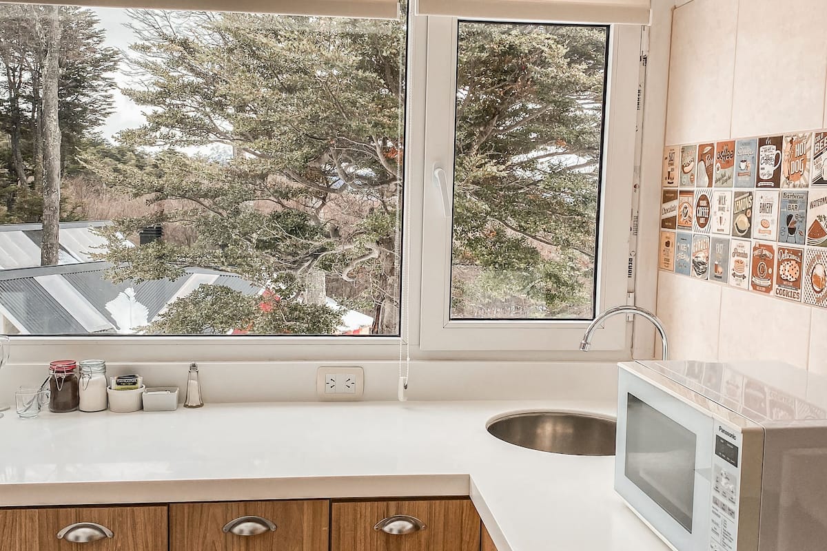 superior cabin | private kitchen | full-sized fridge, microwave, oven, stovetop