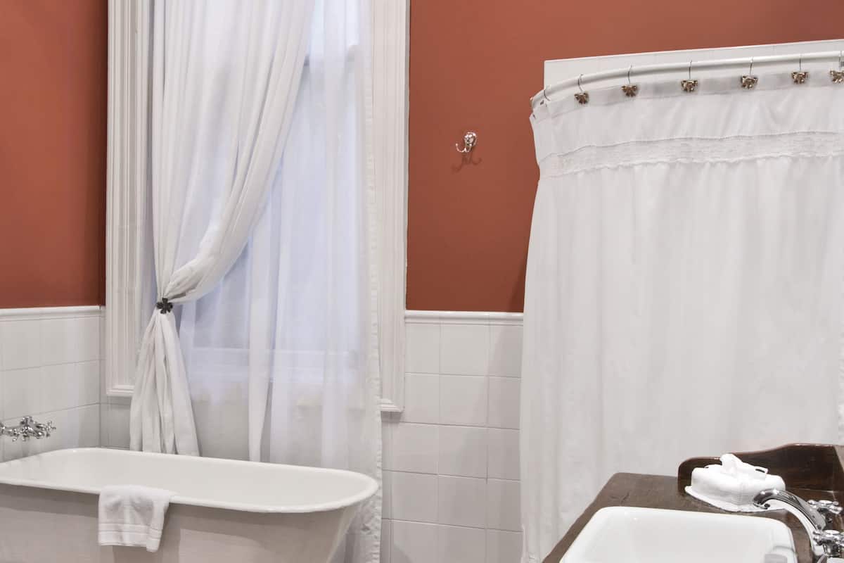 combined shower/bathtub, rainfall showerhead, designer toiletries