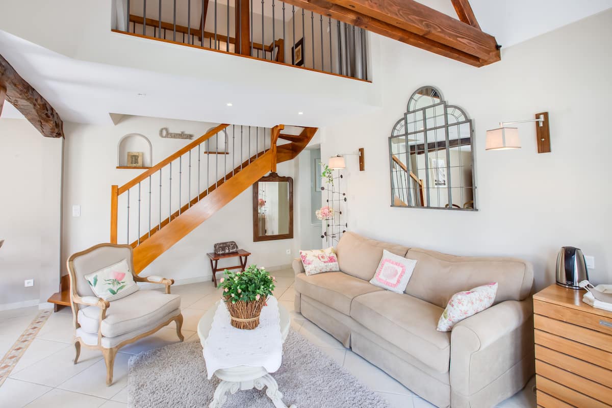 duplex (chambre familiale en duplex) | living area | 32-inch tv with digital channels