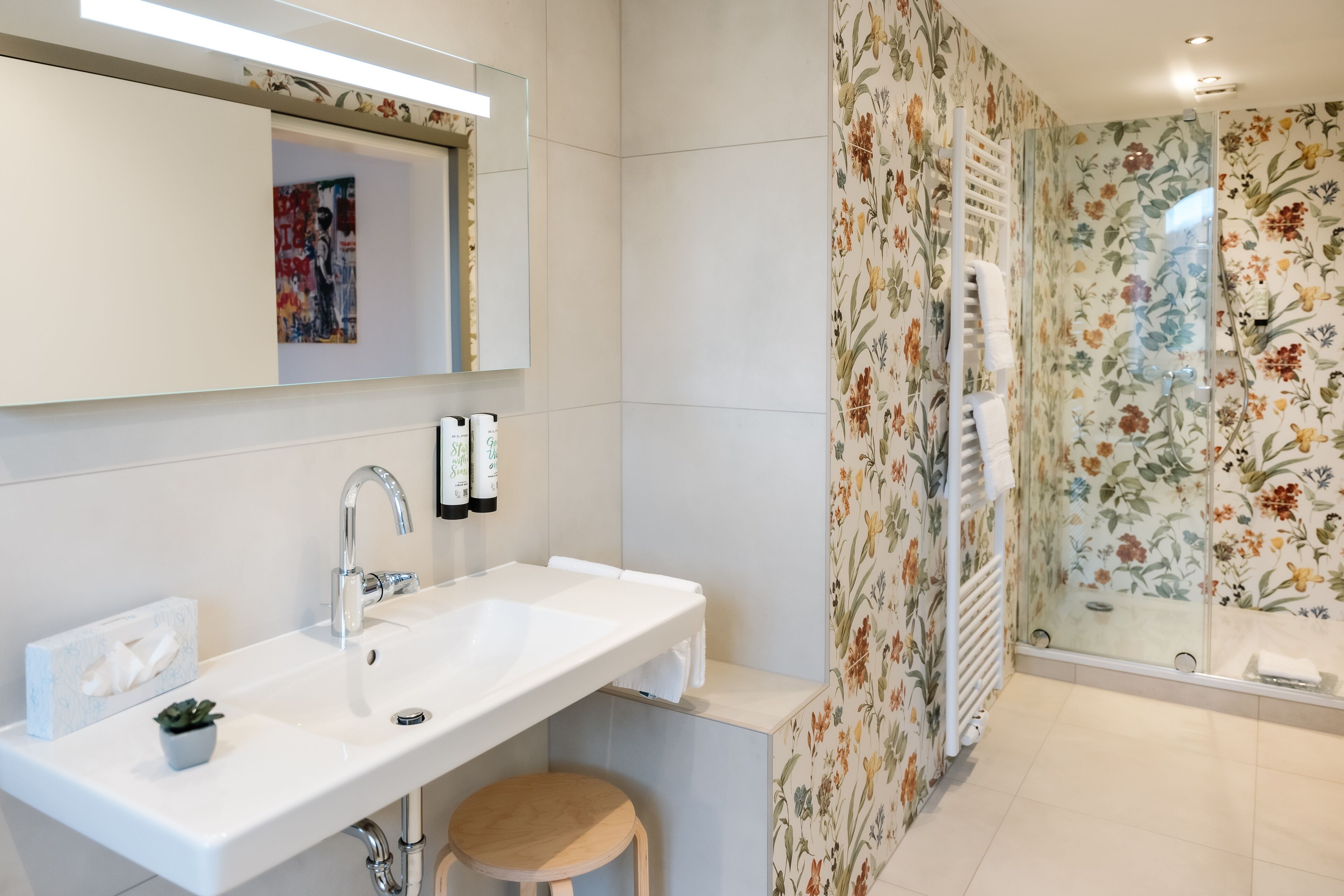 junior suite | bathroom | hair dryer, bathrobes, slippers, towels
