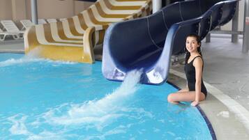 Enjoy a refreshing swim and thrilling water slide experience in our pool area.