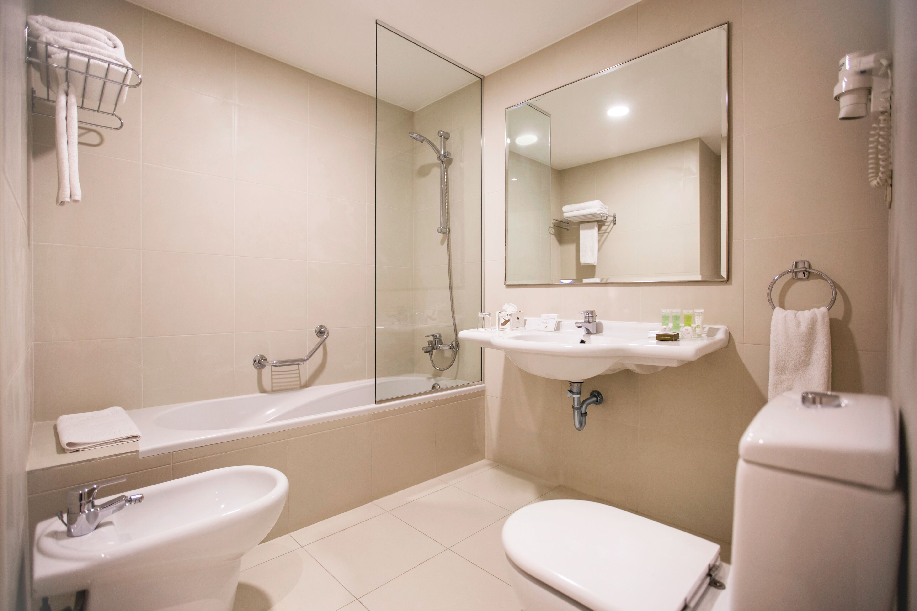 suite, 1 king bed | bathroom | free toiletries, hair dryer, slippers, bidet