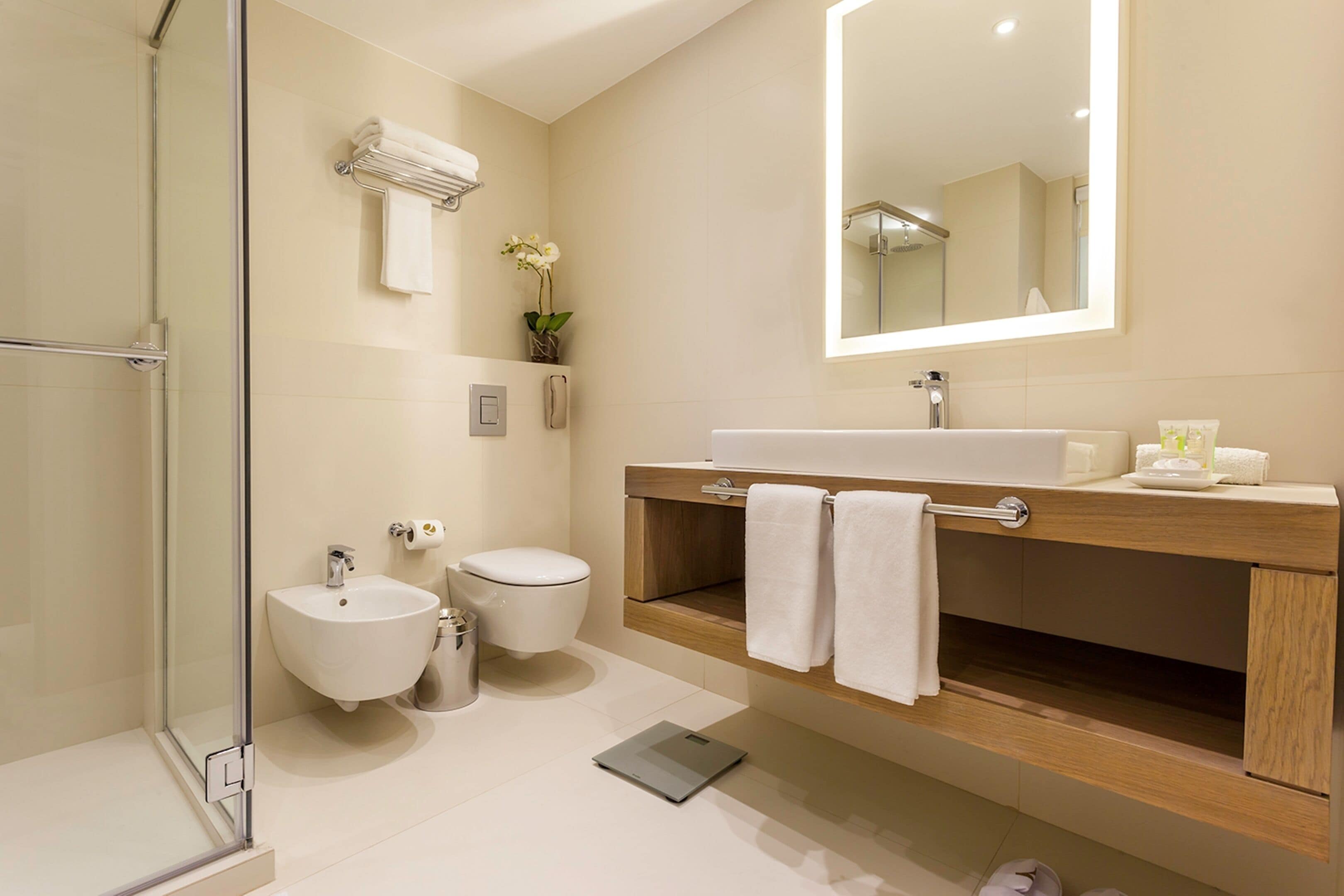 suite, 1 king bed | bathroom | free toiletries, hair dryer, slippers, bidet