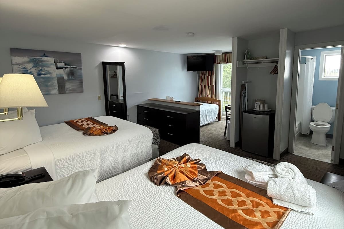Family Room, Multiple Beds, Bay View | Internet, bed sheets, alarm clocks