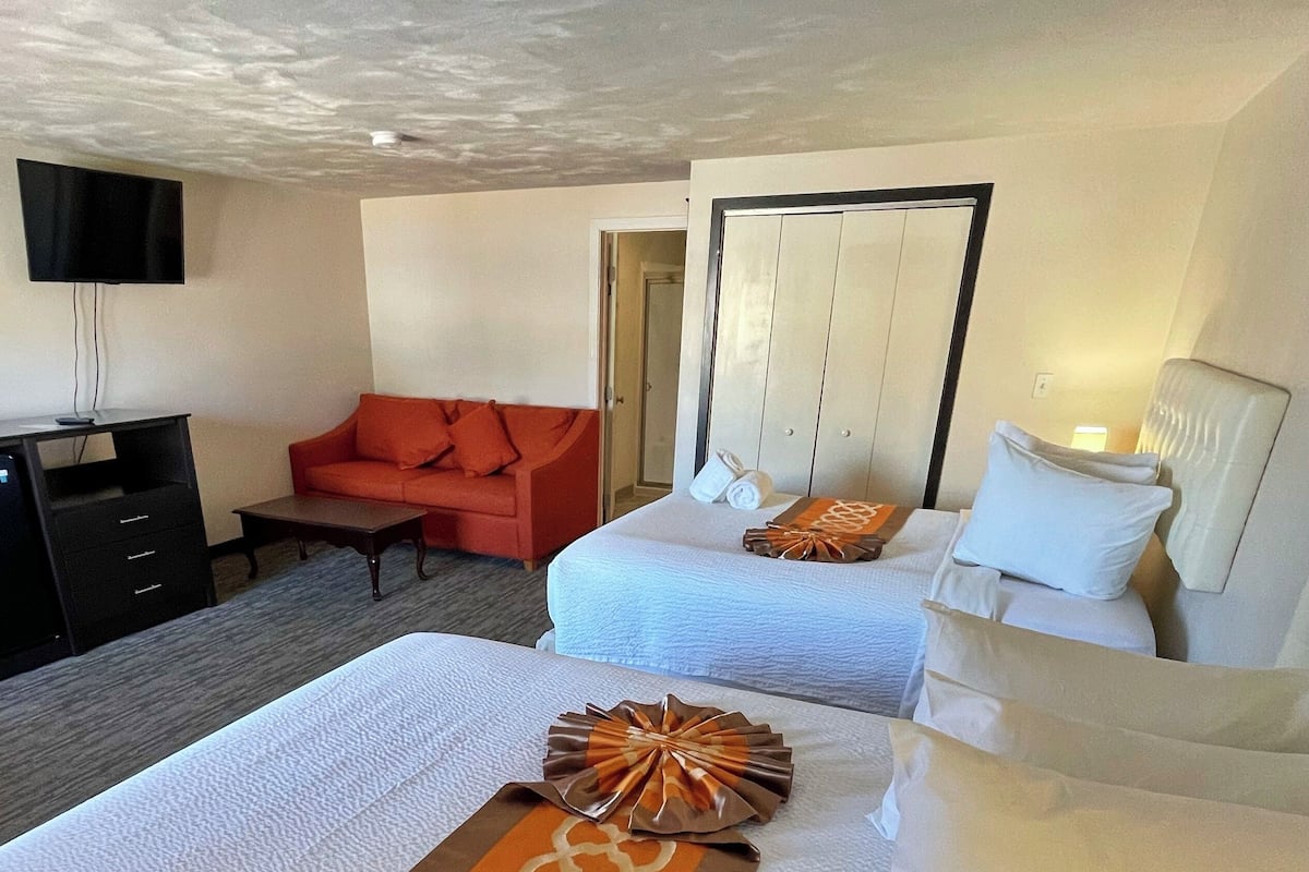 Family Room, Multiple Beds, Pool View | Internet, bed sheets, alarm clocks