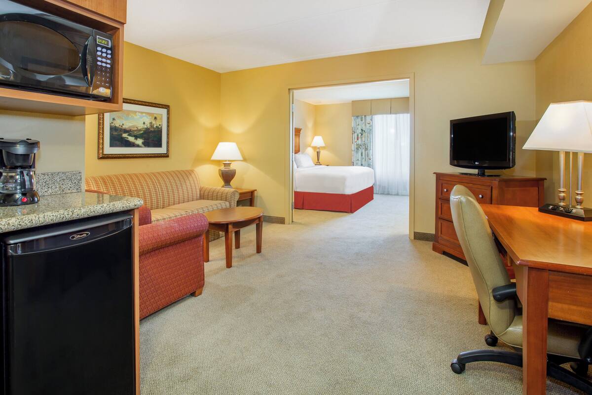In-room safe, desk, iron/ironing board, cribs (free)