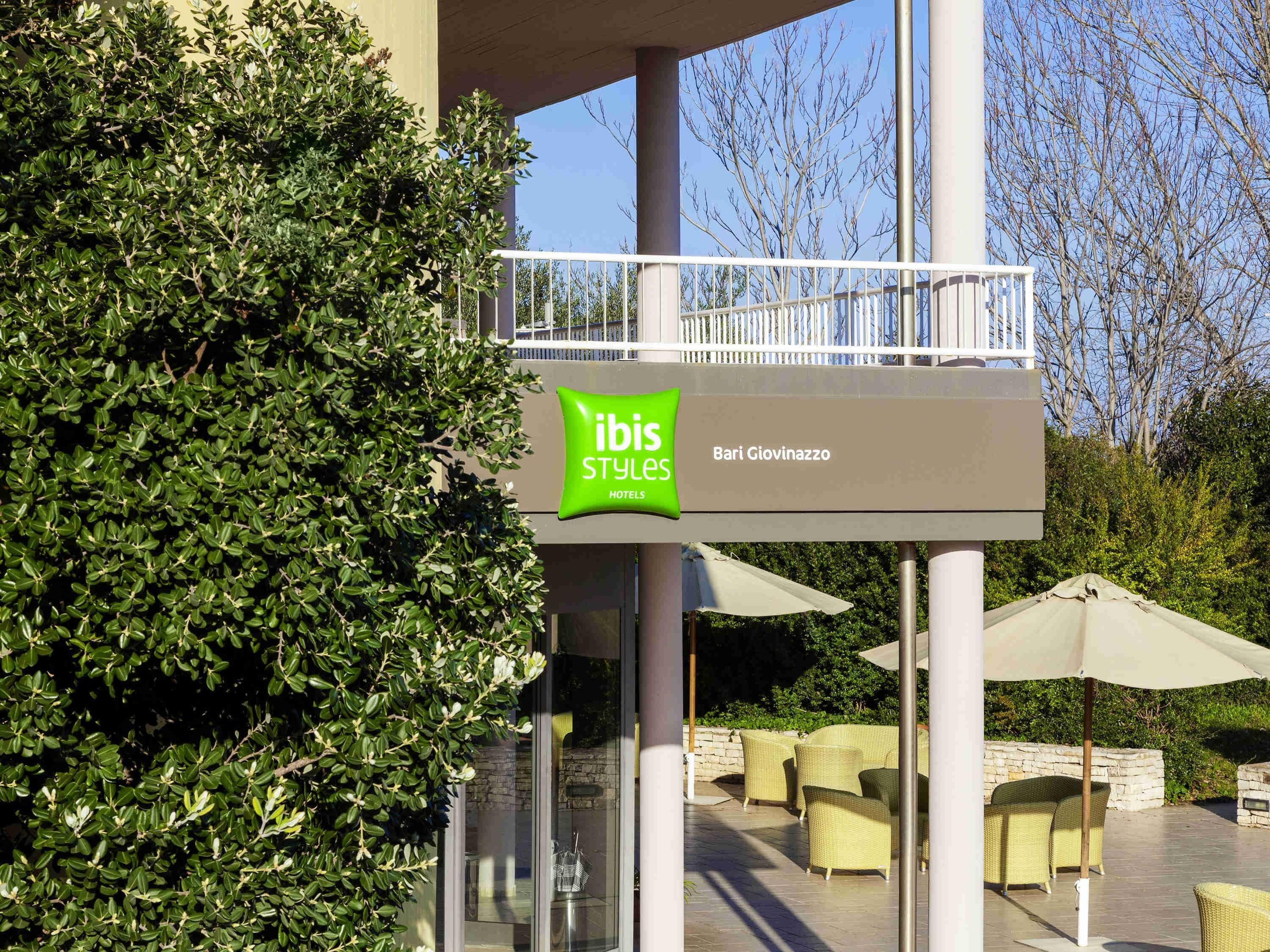 A hotel sign with 'ibis Styles Hotels' and 'Bari Giovinazzo' indicating the hotel name.