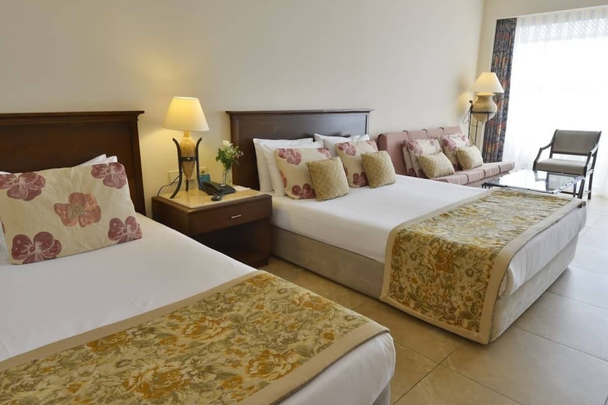 Main Building Standard Sea View Room | Minibar, in-room safe, desk, blackout drapes