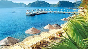 Private beach, sun-loungers, beach umbrellas, beach towels