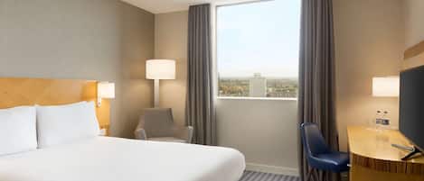 Desk, blackout drapes, iron/ironing board, free cribs/infant beds