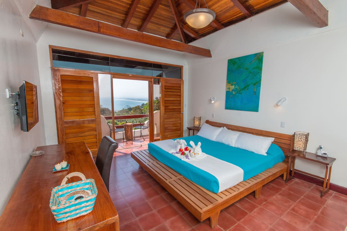 Deluxe Room, Ocean View | In-room safe, desk, free WiFi
