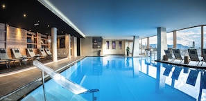 Indoor pool, outdoor pool, pool umbrellas, pool loungers