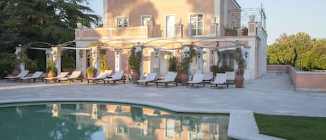 Indoor pool, seasonal outdoor pool, pool umbrellas, sun loungers