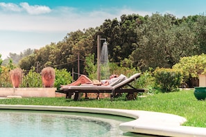 Indoor pool, seasonal outdoor pool, pool umbrellas, pool loungers