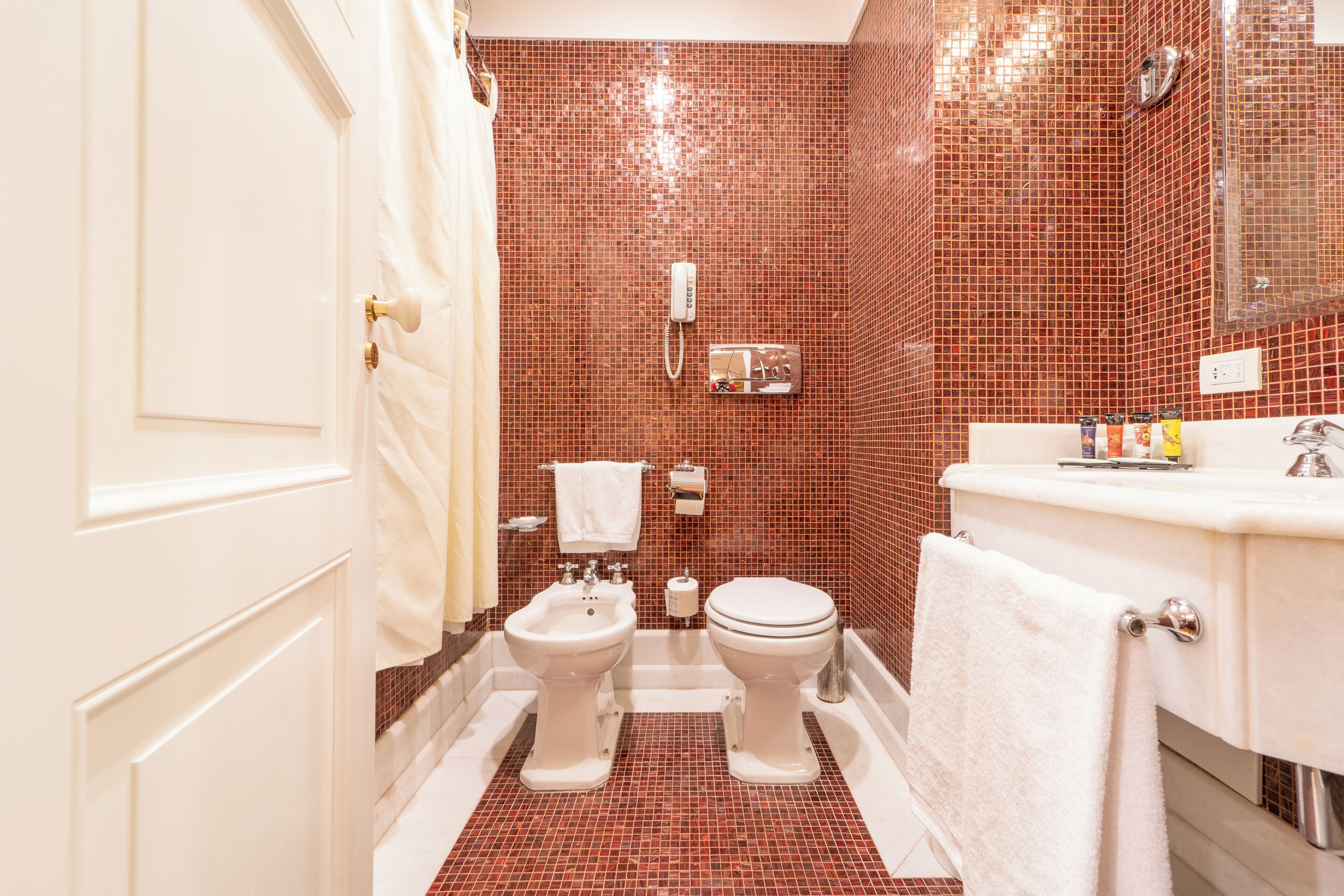 combined shower/bathtub, jetted bath, rainfall showerhead, hair dryer