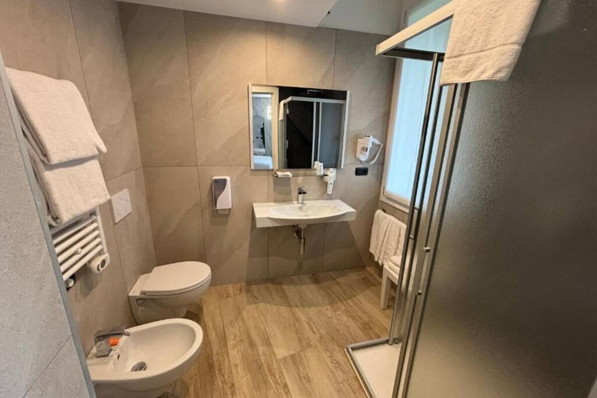 shower, free toiletries, hair dryer, slippers