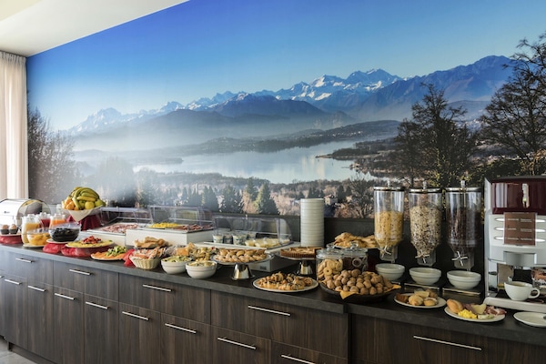 Daily buffet breakfast (EUR 12 per person)