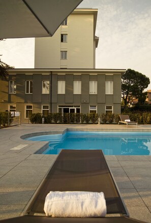 Outdoor pool, pool umbrellas, pool loungers