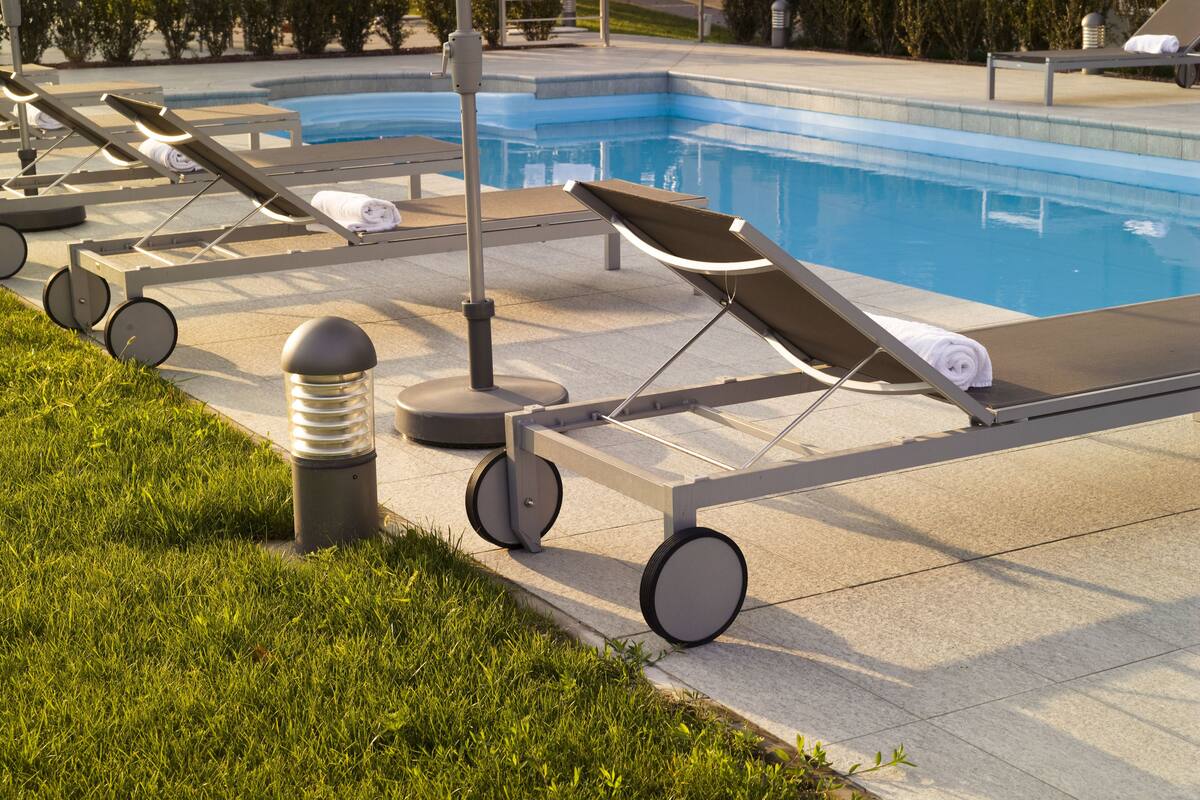 outdoor pool, pool umbrellas, pool loungers