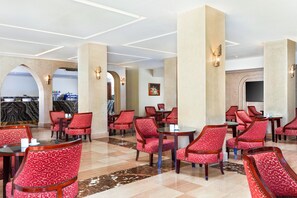 6 bars/lounges, poolside bar, beach bar