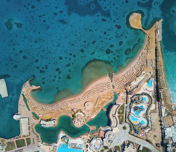 Private beach, free beach shuttle, sun loungers, beach umbrellas