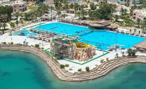 Outdoor pool, pool umbrellas - Calimera Blend Paradise Resort (Hurghada)