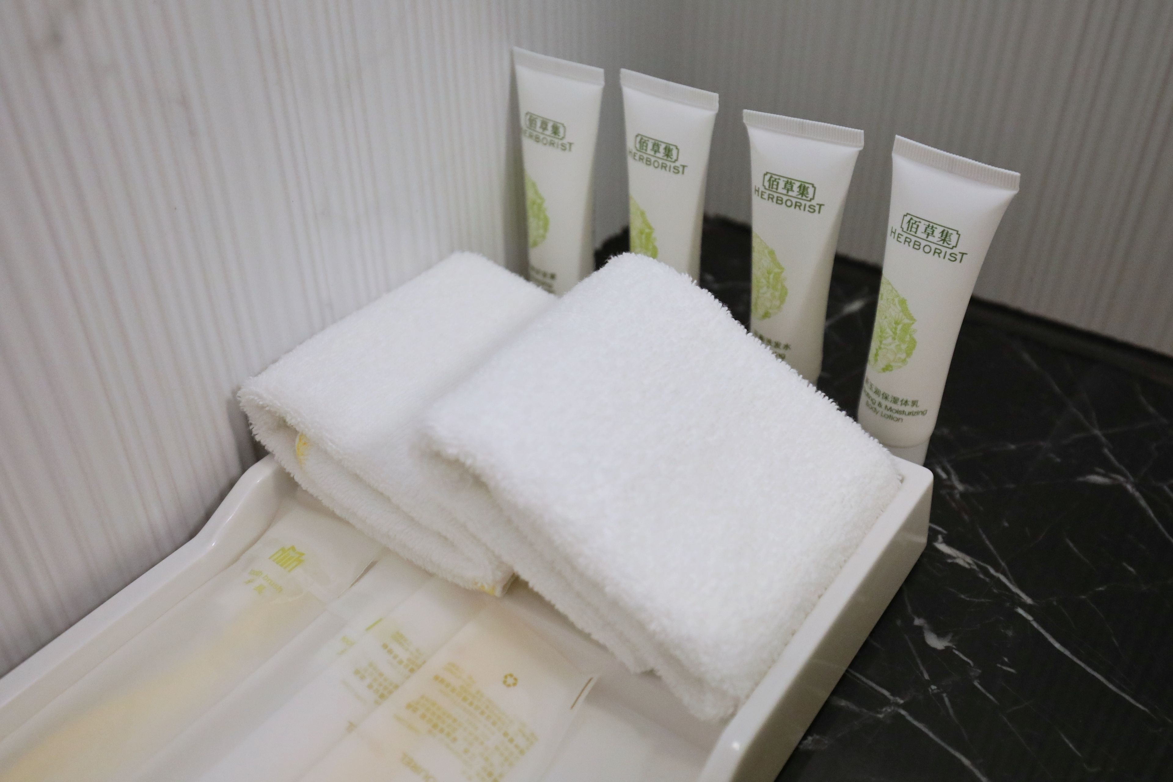 premium bedding, down duvets, desk, blackout curtains