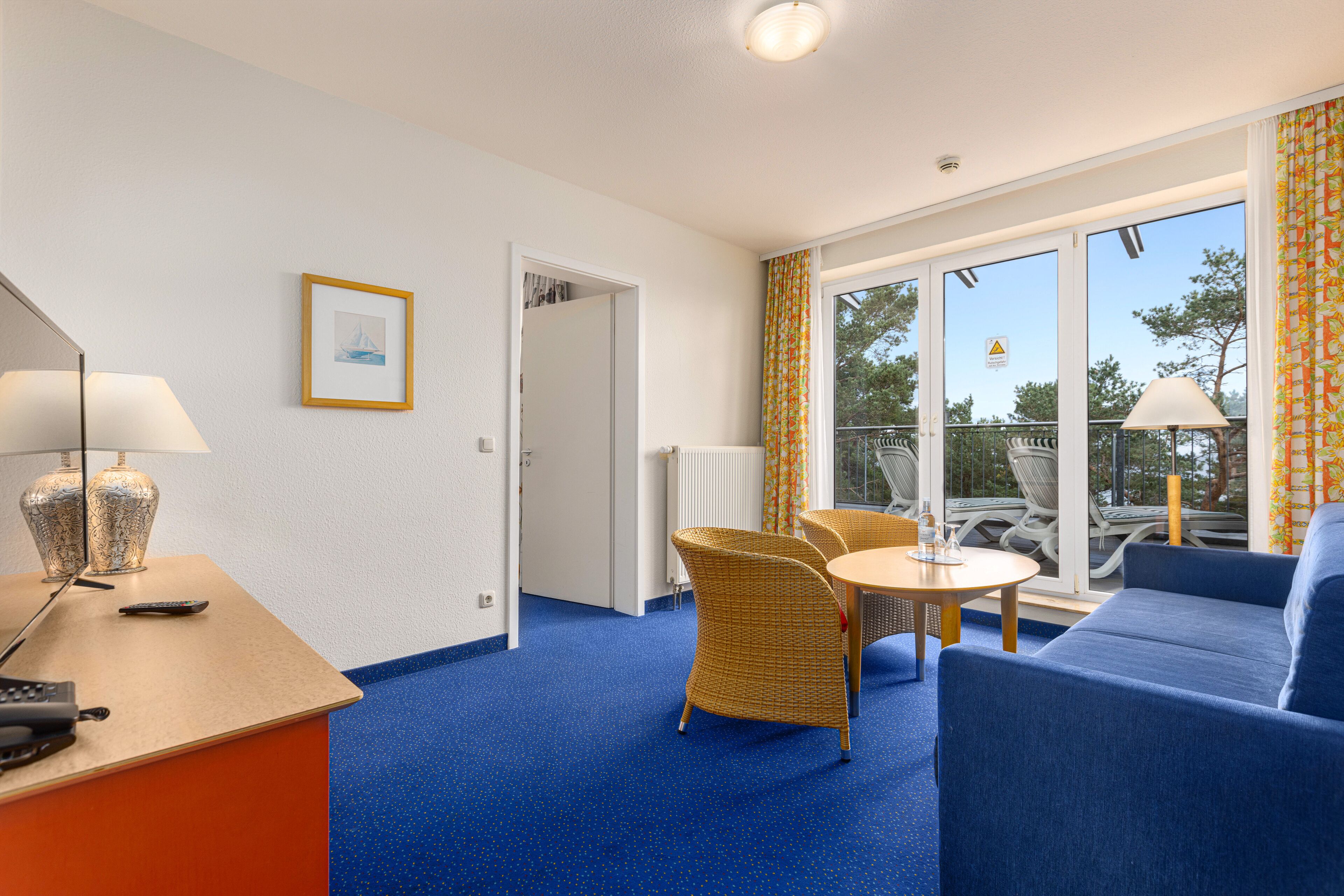 superior suite | living area | 32-inch led tv with cable channels, tv