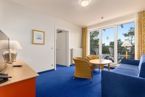 Suíte superior | Área de estar | TV LED 32 polegadas com canais a cabo, TV