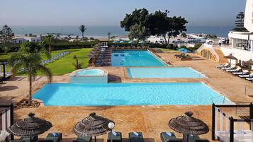 3 outdoor pools, pool umbrellas, sun loungers