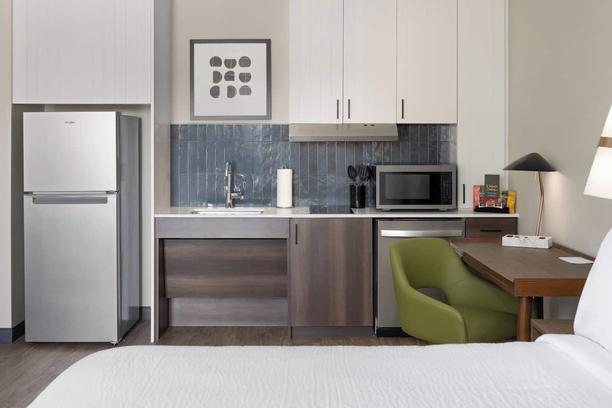 Studio Suite, 1 King Bed, Kitchen | 1 bedroom, iron/ironing board, free WiFi, bed sheets