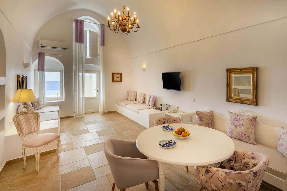 Suite, Hot Tub, Sea View (Master - Caldera View) | Living room | 32-inch Smart TV with digital channels, TV