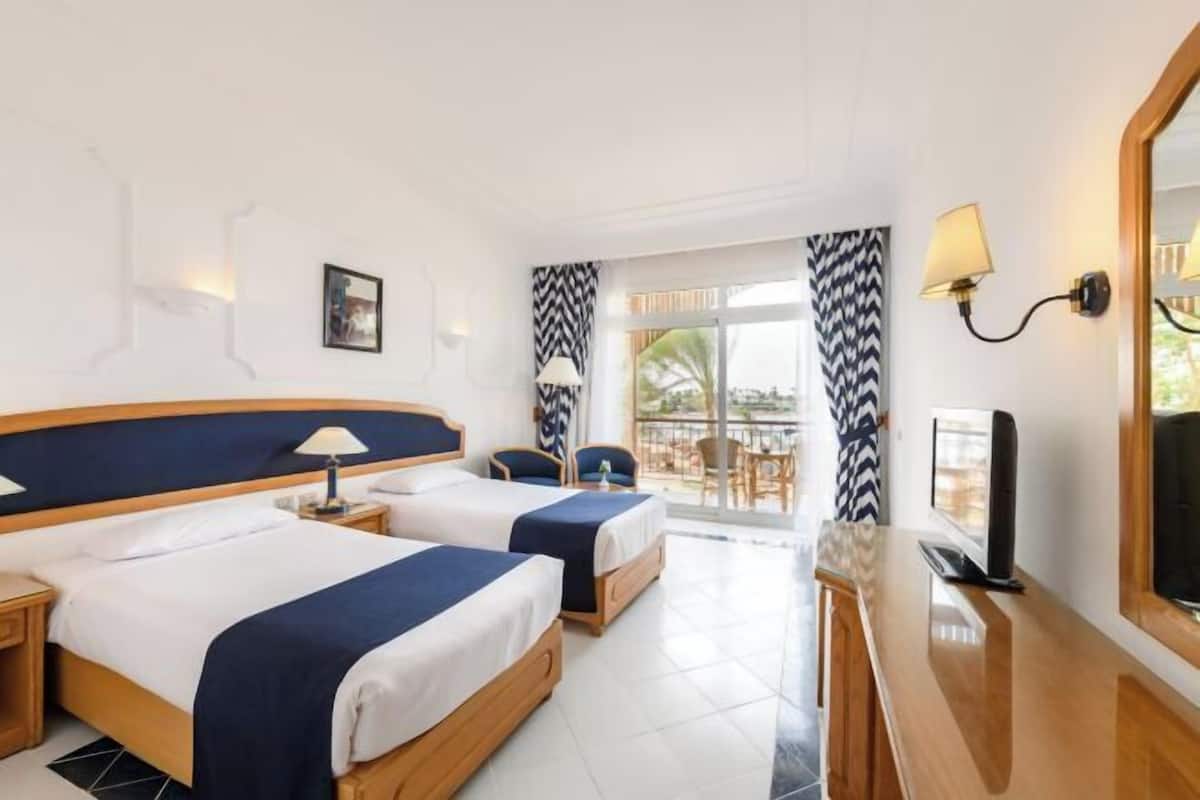 In-room safe, desk, blackout curtains, iron/ironing board (on request)
