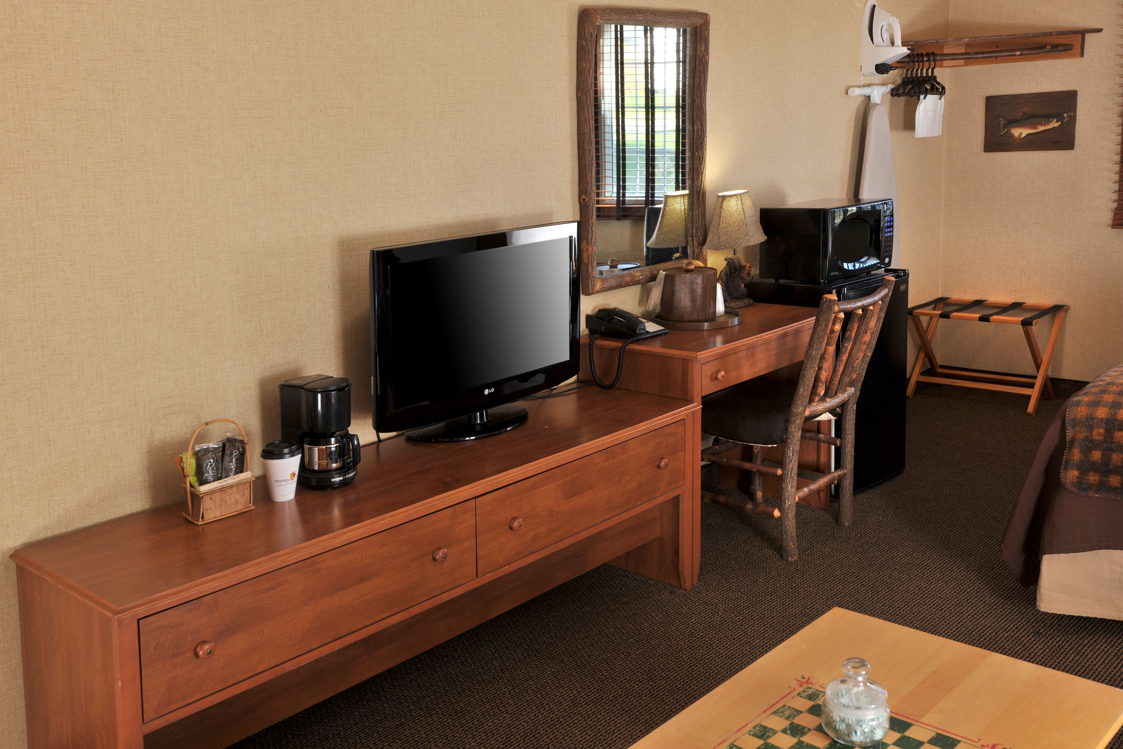 desk, laptop workspace, blackout curtains, iron/ironing board