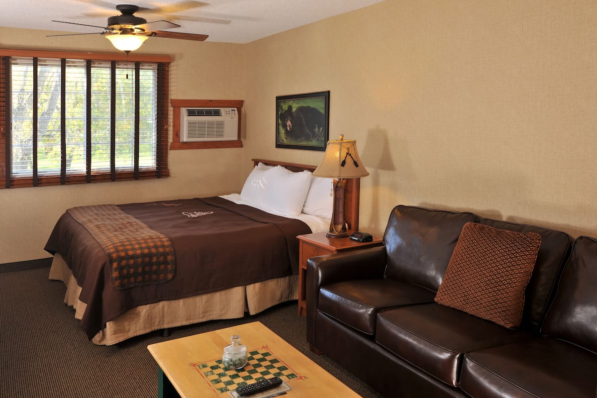 Suite, 1 King Bed with Sofa bed, Non Smoking | Desk, laptop workspace, blackout drapes, iron/ironing board