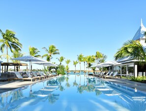 Outdoor pool, pool umbrellas, sun loungers