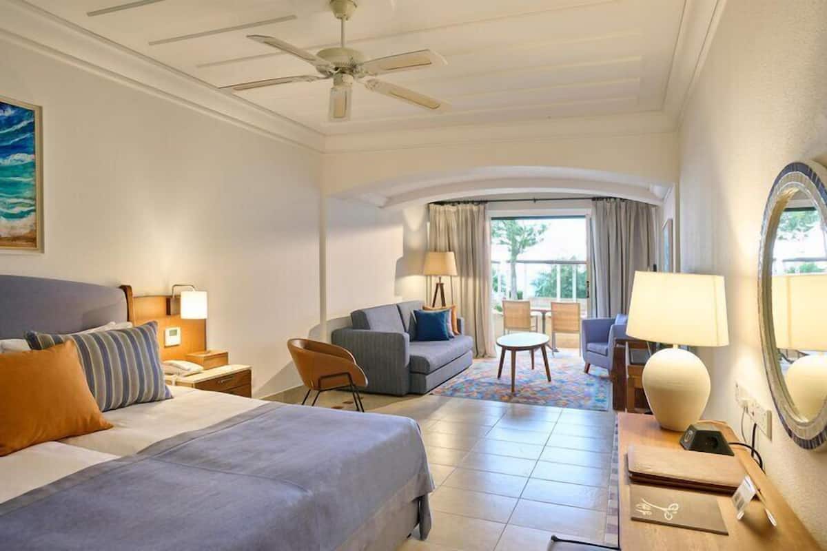 Junior Suite, Sea View | Premium bedding, pillowtop beds, minibar, desk