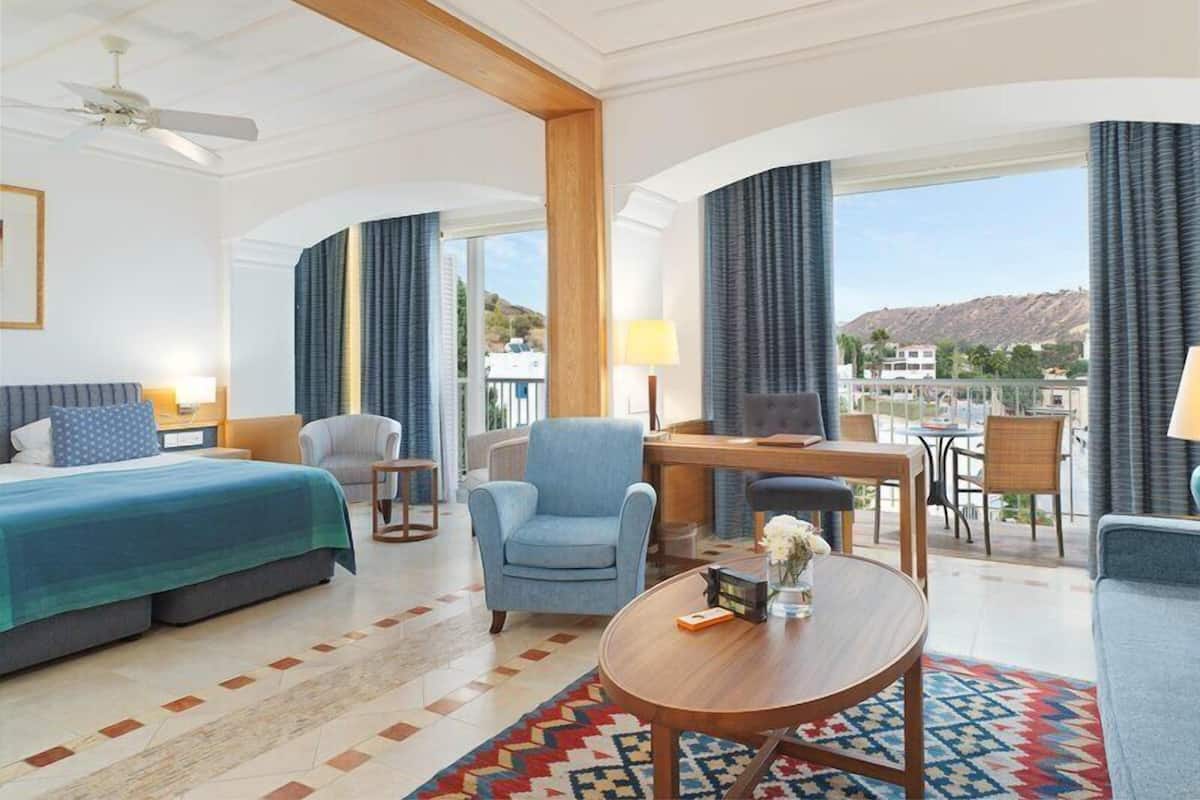 Executive Suite, Partial Sea View | Premium bedding, pillowtop beds, minibar, desk