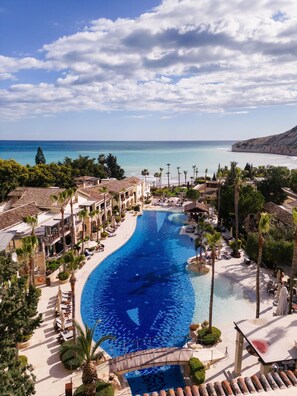 Indoor pool, 2 outdoor pools, open 9:00 AM to 7:00 PM, pool umbrellas