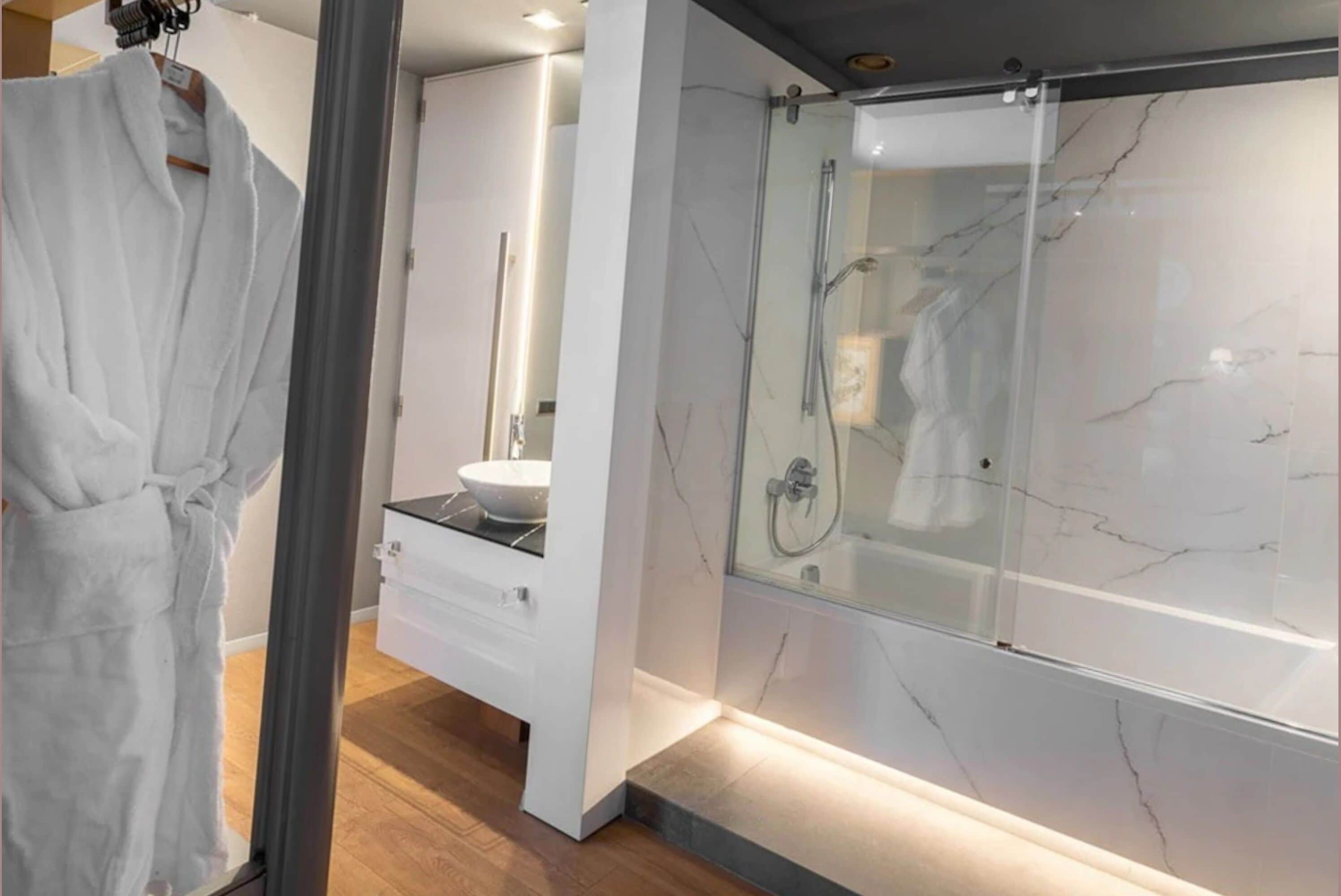 executive double room | bathroom | designer toiletries, hair dryer, towels