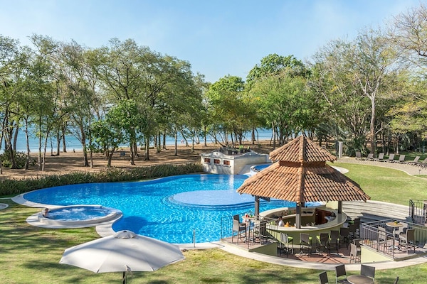 2 outdoor pools, open 6:00 AM to 8:30 PM, pool umbrellas, pool loungers