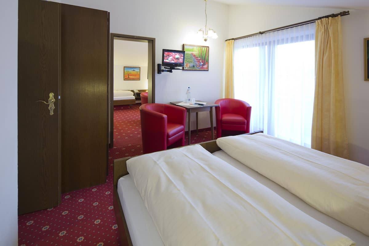 family room | egyptian cotton sheets, premium bedding, down duvets, in-room safe